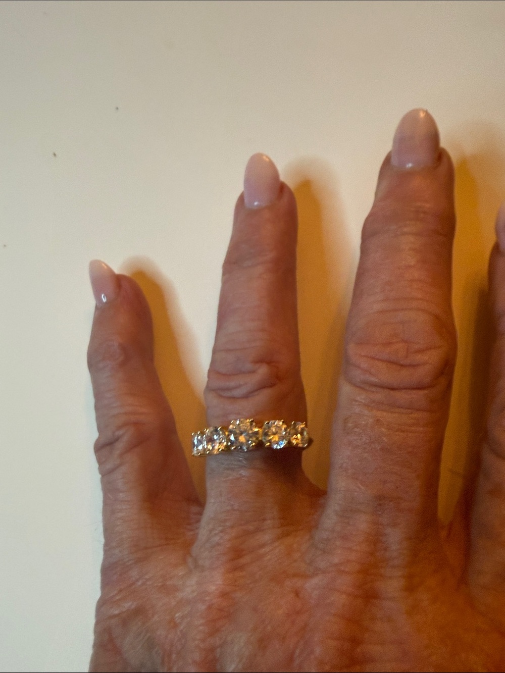 Sparkling five stone crystal ring in sterling silver/gold overlay.